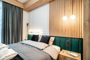 Posteľ alebo postele v izbe v ubytovaní Apartament Niebiańska Polana by Apart Concept Podhale