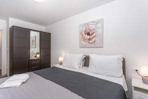 Ένα ή περισσότερα κρεβάτια σε δωμάτιο στο Kvarner bay 4* - Apartments 1 & 3