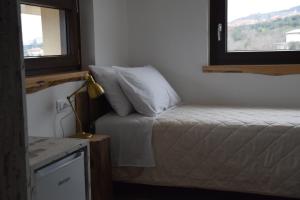 Postel nebo postele na pokoji v ubytování b&b Adamà