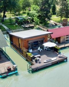 an aerial view of a house on the water at Beach House Belgrade in Belgrade