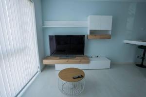 TV a/nebo společenská místnost v ubytování Apartamento con TERRAZA en Burela