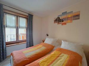 A bed or beds in a room at Skyrim Apartment - City Centre