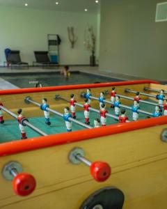a group of toy figurines playing a game of bowling at Domaine de La Soudelle in Chanceaux-sur-Choisille