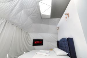 Ένα ή περισσότερα κρεβάτια σε δωμάτιο στο Seagloo Glamping - Adults Only