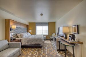 Ένα ή περισσότερα κρεβάτια σε δωμάτιο στο Holiday Inn - Appleton by IHG