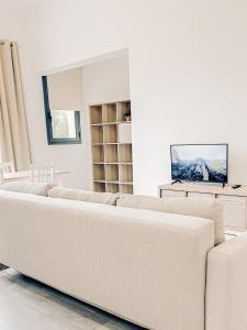 TV a/nebo společenská místnost v ubytování Zagare & Mare