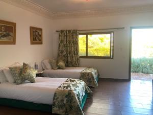 Postel nebo postele na pokoji v ubytování Riad Hamdani + 29 fotografií