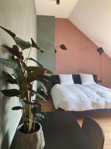 Postel nebo postele na pokoji v ubytování Boutique Hotel Marie Marie