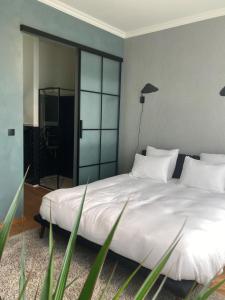 Postel nebo postele na pokoji v ubytování Boutique Hotel Marie Marie