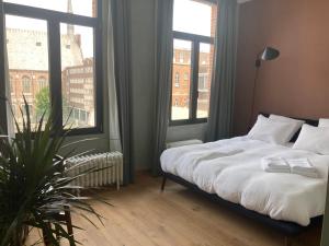 Postel nebo postele na pokoji v ubytování Boutique Hotel Marie Marie