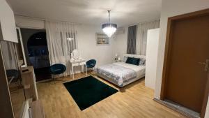 Postel nebo postele na pokoji v ubytování Apartments Dibra