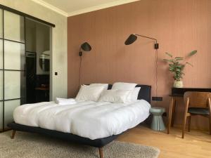Postel nebo postele na pokoji v ubytování Boutique Hotel Marie Marie