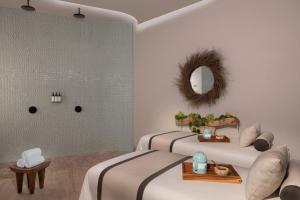 Кровать или кровати в номере Impression Isla Mujeres by Secrets - Adults Only - All Inclusive