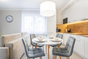 Η κουζίνα ή μικρή κουζίνα στο Apartamenty Porto
