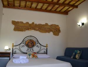 Postel nebo postele na pokoji v ubytování HOTEL Cala Buguto
