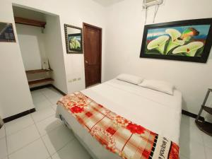 Postel nebo postele na pokoji v ubytování Bahia B&B