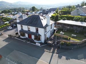 an aerial view of a house in a small town at Y Llew Coch in Conwy