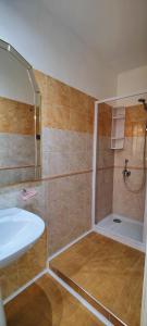 a bathroom with a shower and a sink at Il Principe casa vacanze in Trabia