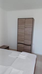 Postel nebo postele na pokoji v ubytování ARIA