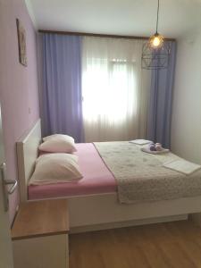 Postel nebo postele na pokoji v ubytování Apartments Jasna