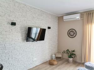 TV a/nebo společenská místnost v ubytování Apartments Jasna
