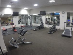 The fitness center and/or fitness facilities at Grand Hotel & Suites