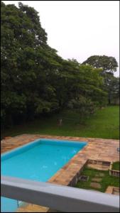 Der Swimmingpool an oder in der Nähe von Chacara Mimosa