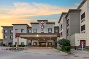 uma representação da frente de um hotel em Best Western Plus Texoma Hotel & Suites em Denison