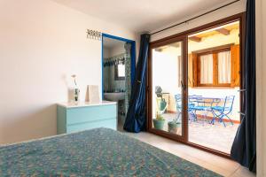Un pat sau paturi într-o cameră la Villetta Fabi