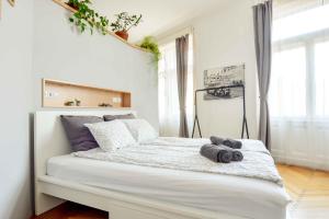 Posteľ alebo postele v izbe v ubytovaní Dohany Design Apartments