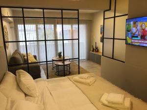 Una cama o camas en una habitación de Departamento en primer piso a 900 metros de La Balcarce