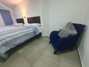 Postel nebo postele na pokoji v ubytování FIESTA MIRAMAR
