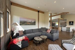 a living room with a couch and a table at Coastal Calm at Sea Ranch in Sea Ranch