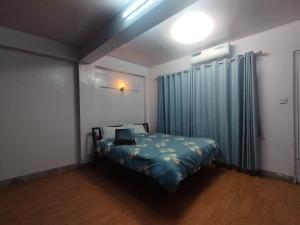 Postel nebo postele na pokoji v ubytování Hotel Ryan