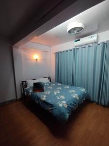 Postel nebo postele na pokoji v ubytování Hotel Ryan