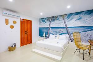 a bedroom with a bed and a painting of palm trees at Lombok Khophilauvillas in Kuta Lombok