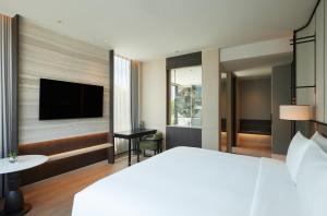 เตียงในห้องที่ dusitD2 Samyan Bangkok