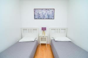 Postel nebo postele na pokoji v ubytování House Rosa