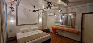 Кровать или кровати в номере White Sand Himandhoo