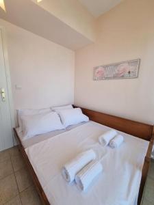 Postel nebo postele na pokoji v ubytování Lux Siviris apartments