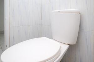 Koupelna v ubytování RedDoorz Syariah at Griya Merbotan Demak