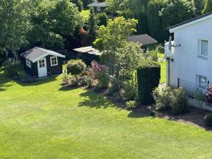 an aerial view of a yard with a house at Haus Antje in Scharbeutz +27 photos