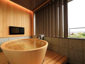 TV a/nebo společenská místnost v ubytování Hotel Gion Ichirin