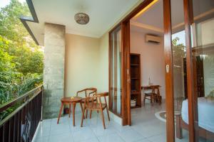 Balkón nebo terasa v ubytování Ahamta Ubud by Prasi