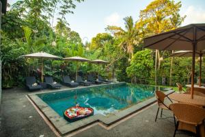 Bazén v ubytování Ahamta Ubud by Prasi nebo v jeho okolí