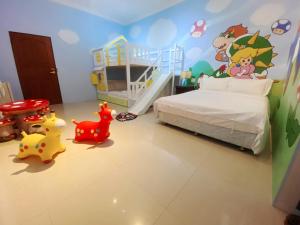 Postel nebo postele na pokoji v ubytování Hualien Lidu House