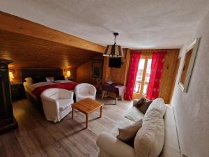 Postel nebo postele na pokoji v ubytování Hotel Schlosswirt