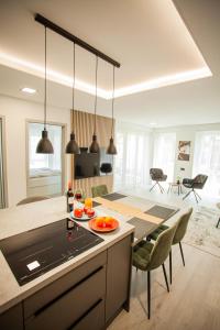 A kitchen or kitchenette at Central Relax Apartment