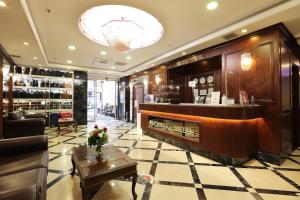 a lobby of a store with a bar and a table at Alpinn Hotel Istanbul in Istanbul