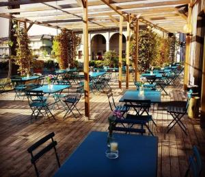 a group of tables and chairs on a patio at Locanda Da Romano in Cadeo
